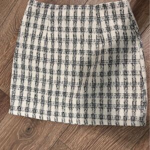 Francesca’s plaid skirt